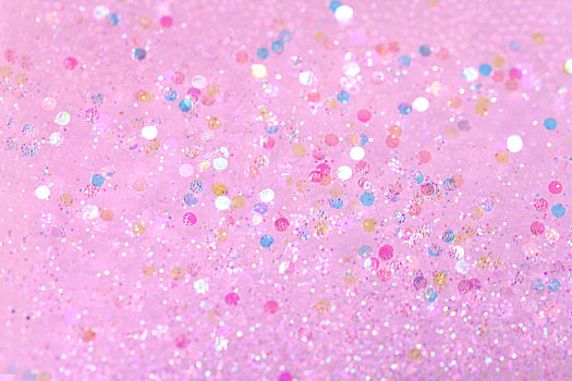 闪烁的的粉色珍珠细沙背景