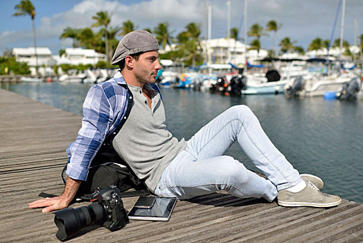 摄影师,放松,码头,木质露台