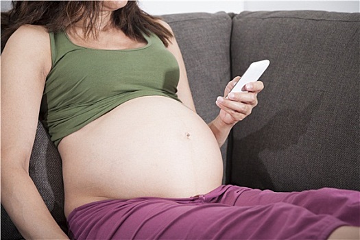怀孕,智能手机,沙发
