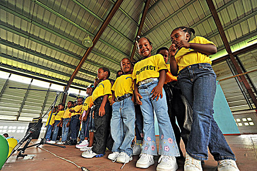 dominica,carib,territory,children,with,a,respect,tshirt,singing,during,school,fair