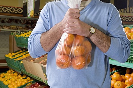 腰部,一个,男人,拿着,橘子,超市