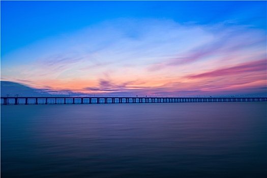 海边蓝色天空日落晚霞