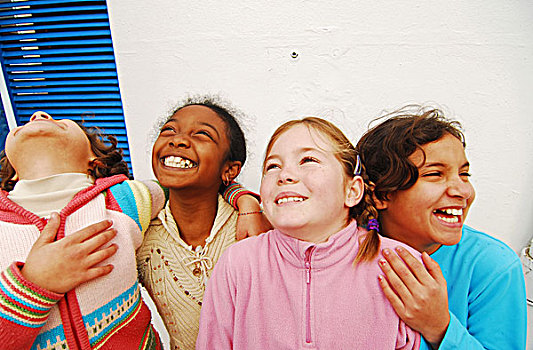 libya,tripoli,4,girls,of,mixed,race,laughing,and,hugging,together