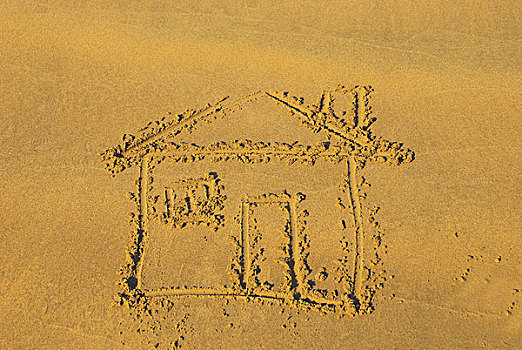 海边沙滩上房屋的图案