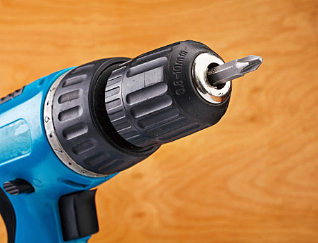 电钻,钻头,木质背景