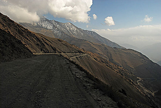 tajikistan,inland,rocky,road,in,high,attitudes,towards,dushanbe,capital,city