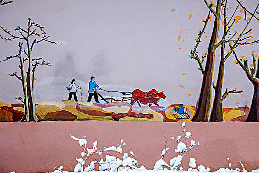 云南东川红土地雪原中的农舍墙头壁画