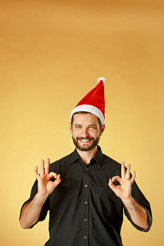 微笑,圣诞节,男人,戴着,圣诞帽