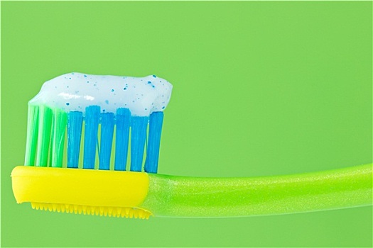 牙刷,绿色背景