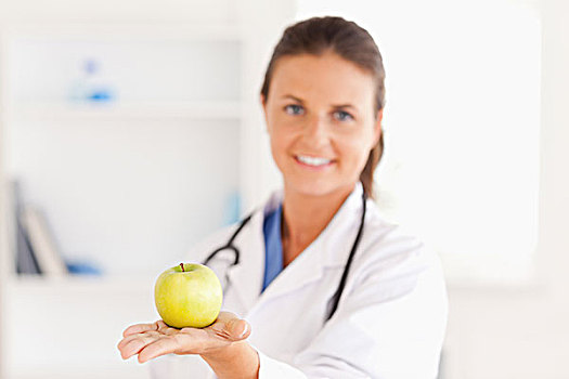 博士,听诊器,拿着,苹果,看镜头