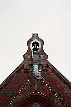 特写镜头的钟,塔,旧砖教堂,在冬季,阿姆鲁姆岛,德国