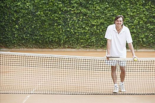 肖像,中年,男人,拿着,网球,网球拍