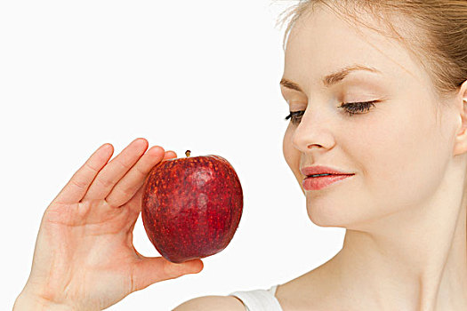 女人,拿着,苹果,看,白色背景