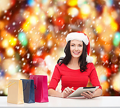 圣诞节,圣诞,网上购物,电子产品,概念,微笑,女人,圣诞老人,帽子,购物袋,平板电脑,电脑