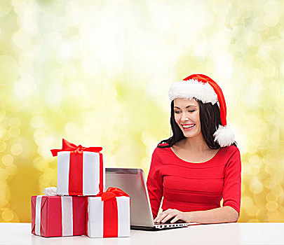 圣诞节,圣诞,网上购物,概念,女人,圣诞老人,帽子,礼盒,笔记本电脑