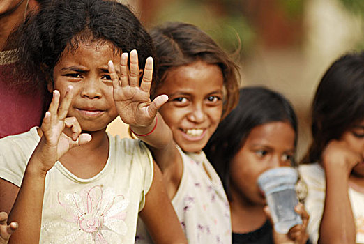 timorese,man,clapping,in,his,hand,classroom