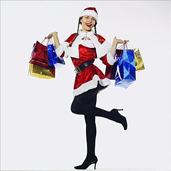 微笑,女人,姿势,装扮,圣诞老人,拿着,购物袋