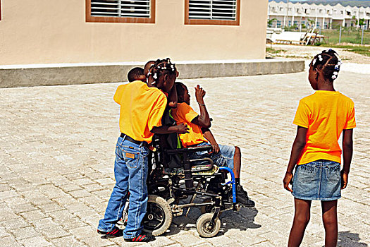haiti,port,au,prince,handicapped,boy,taking,pictures