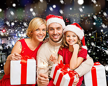 圣诞节,休假,家庭,人,概念,高兴,母亲,父亲,小女孩,圣诞老人,帽子,礼盒,上方,雪,夜晚,城市,背景