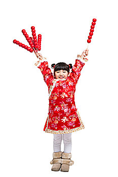 棚拍中国新年唐装儿童拿糖葫芦