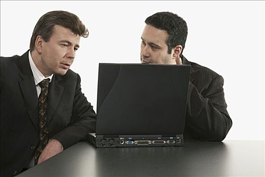 两个,商务人士,坐,后面,笔记本电脑