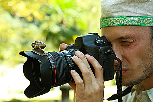 摄影师,摄像机,蜗牛