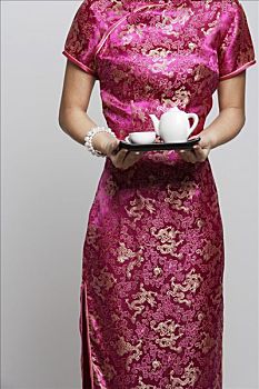 局部,女人,穿,粉色,旗袍,拿着,茶