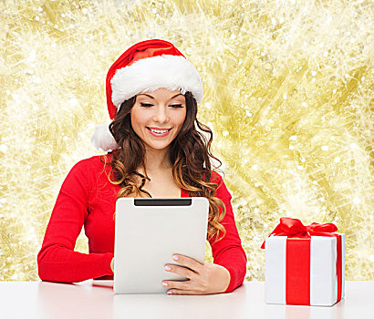 圣诞节,休假,科技,人,概念,微笑,女人,圣诞老人,帽子,礼盒,平板电脑,电脑,上方,黄光,背景