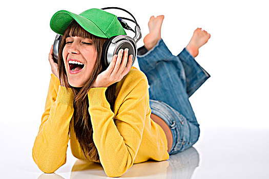 高兴,女青年,享受,音乐,耳机,棒球帽