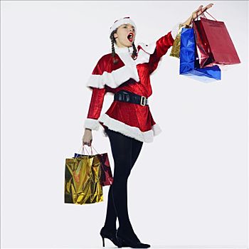 女人,装扮,圣诞老人,叫,购物袋,手臂,伸展,向前
