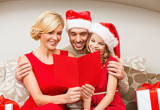 家庭,圣诞节,圣诞,冬天,高兴,人,概念,微笑,圣诞老人,帽子,许多,礼盒,读,明信片