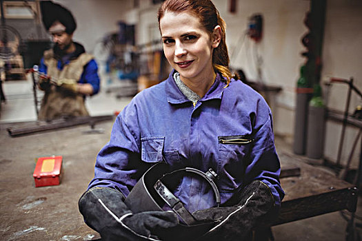 女性,焊接,防护工作服,同事,工作,背景