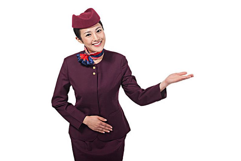 棚拍年轻女服务员做手势_高清图片_全景视觉