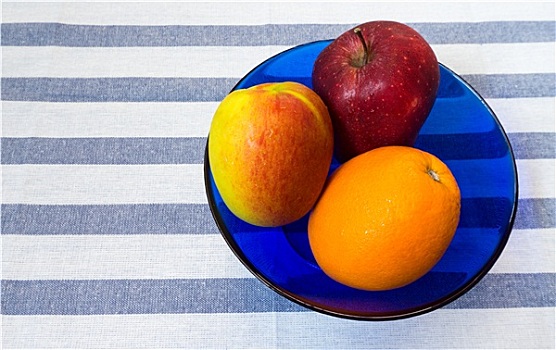 两个,苹果,橙色,蓝色,玻璃碗,条纹,背景