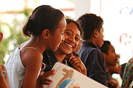 profile,of,2,two,timorese,girl,smiling