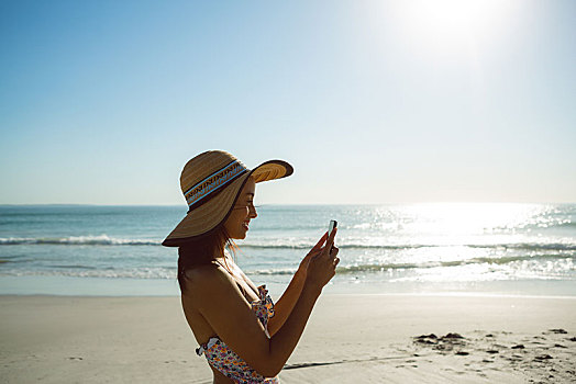 女人,帽子,打手机,海滩