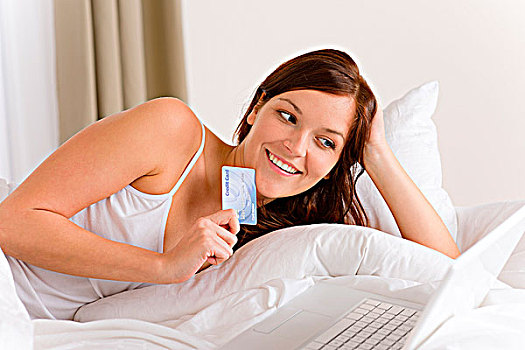 家,网上购物,女人,信用卡,躺下,白人,床