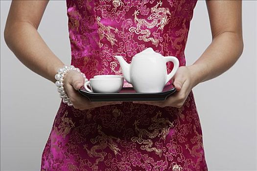 局部,女人,穿,粉色,旗袍,拿着,茶