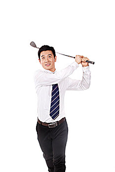 一个青年商务男士手握高尔夫球杆
