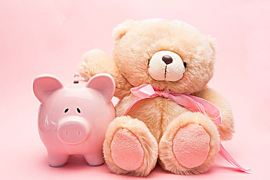 泰迪熊,存钱罐,粉色背景