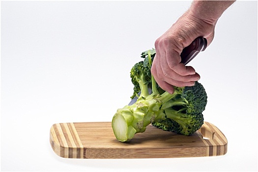 蔬菜,花椰菜,握着,刀,白色背景