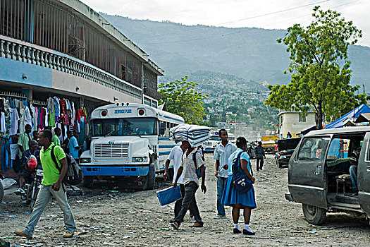 haiti,port,au,prince,school,children,walking,through,the,destroyed,street