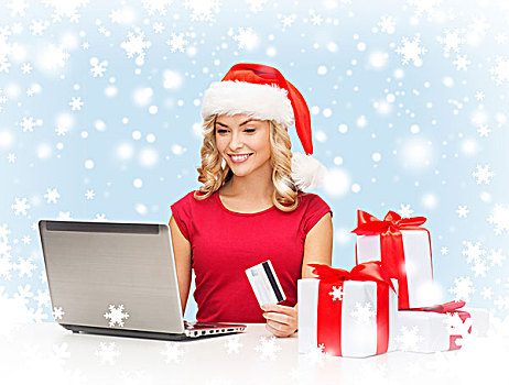 圣诞节,圣诞,网上购物,概念,女人,圣诞老人,帽子,礼盒,笔记本电脑,信用卡