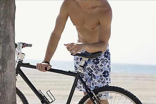 一个,男人,站立,拿着,自行车,海滩