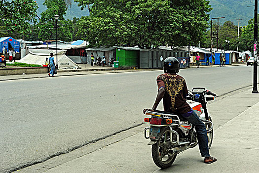 haiti,port,au,prince,motocycle,in,front,of,camps,champ,de,mars