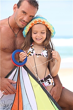 父亲,女儿,放风筝,海滩