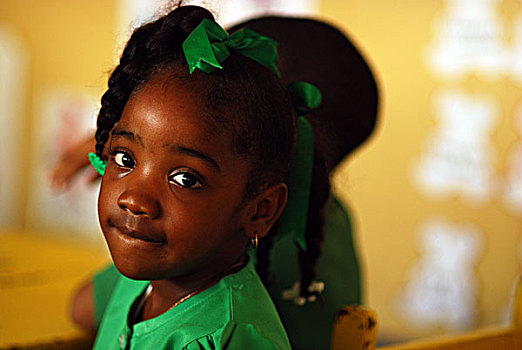 dominica,roseau,preschool,social,center,portait,of,girl,with,braids