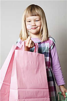 小女孩,购物袋,棒棒糖