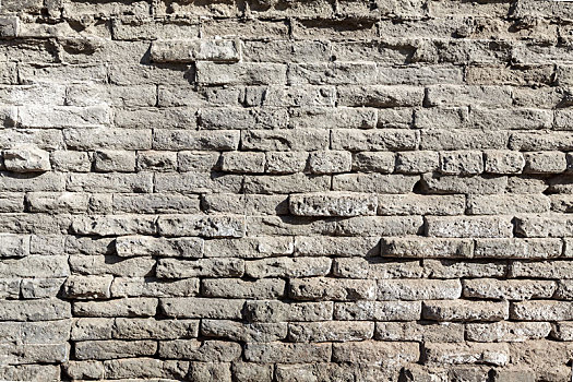 风化斑驳的老砖墙背景纹理