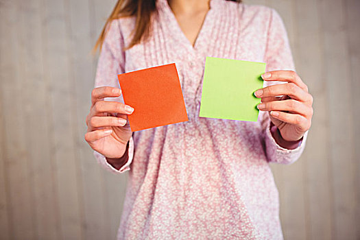 女人,拿着,绿色,橙色,卡片,厚木板,背景